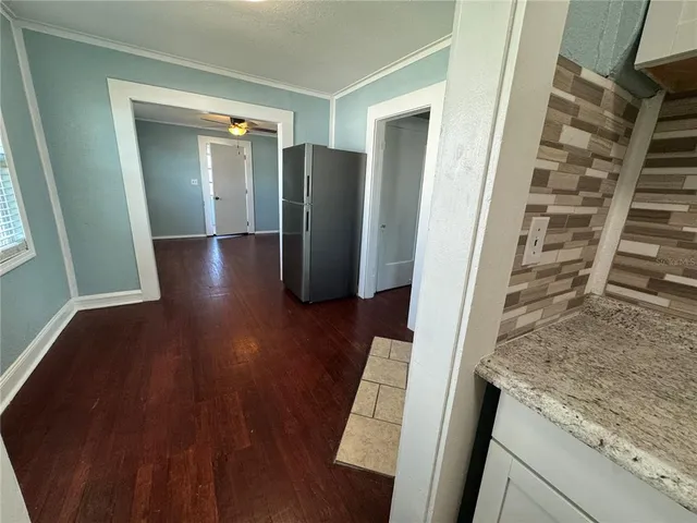 a view of entryway with wooden floor