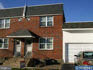 502 Benner Street Philadelphia, PA 19111 - Photo 1 of 1 a front view of a house with a garage