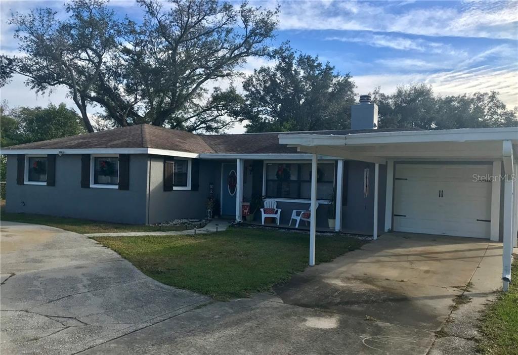 2105 East Lumsden Road Valrico, FL 33594 - Photo 1 of 1 front view of a house with a yard