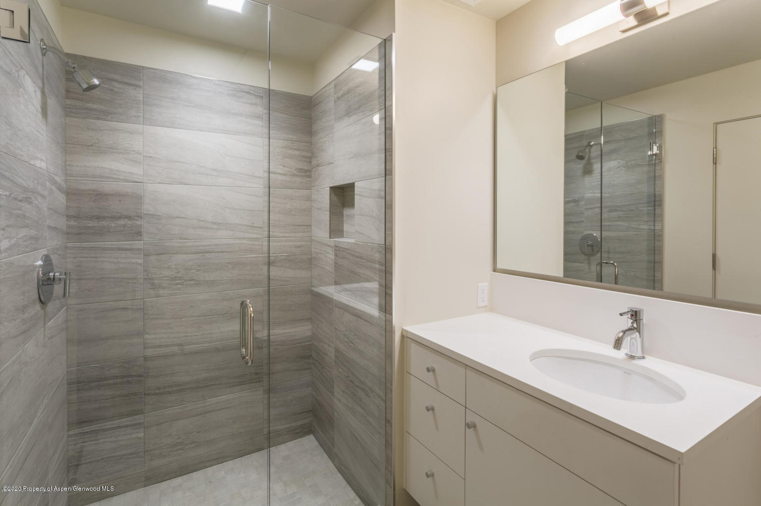 101 Willits Lane, Unit 107 Basalt, CO 81621 - Photo 12 of 16 a bathroom with a sink shower and a mirror