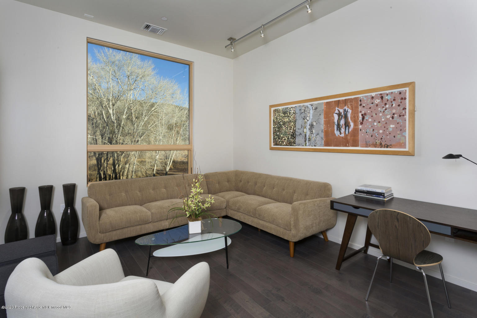 101 Willits Lane, Unit 107 Basalt, CO 81621 - Photo 13 of 16 a living room with furniture and a window