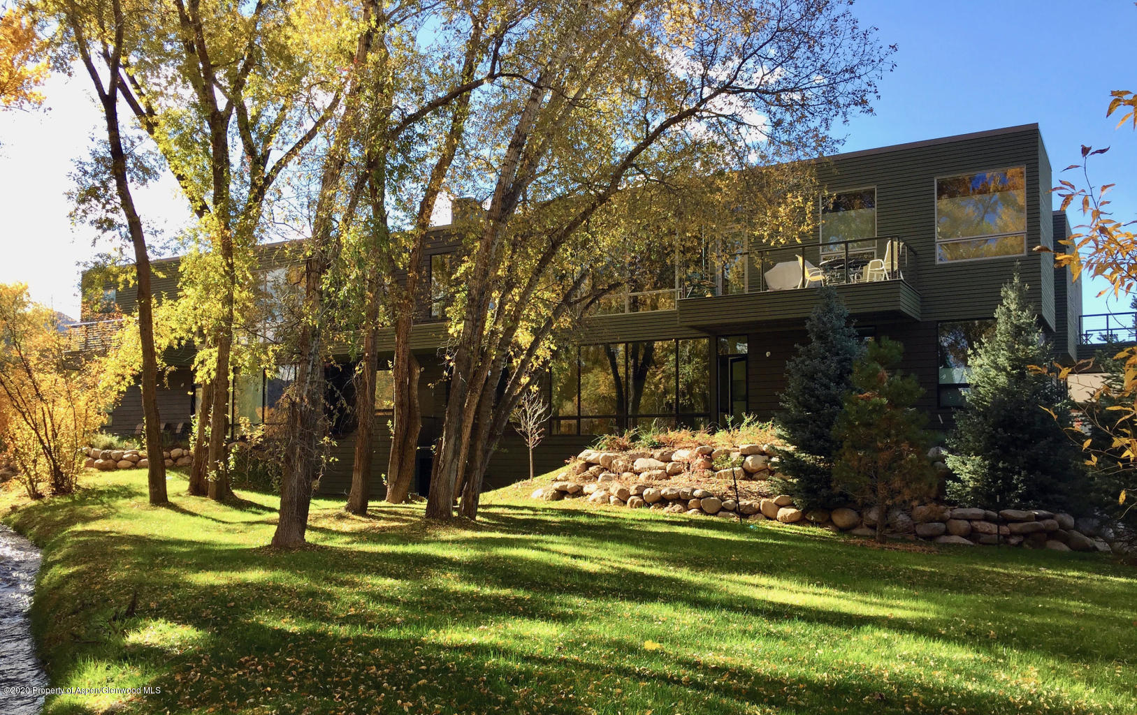 101 Willits Lane, Unit 107 Basalt, CO 81621 - Photo 16 of 16 a view of a house with a yard