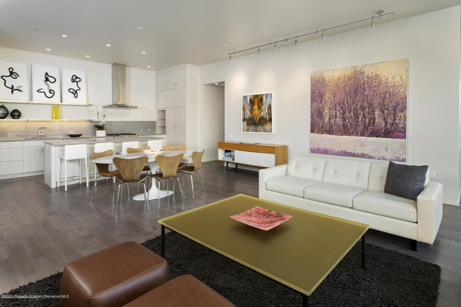 101 Willits Lane, Unit 107 Basalt, CO 81621 - Photo 3 of 16 a living room with furniture and a table