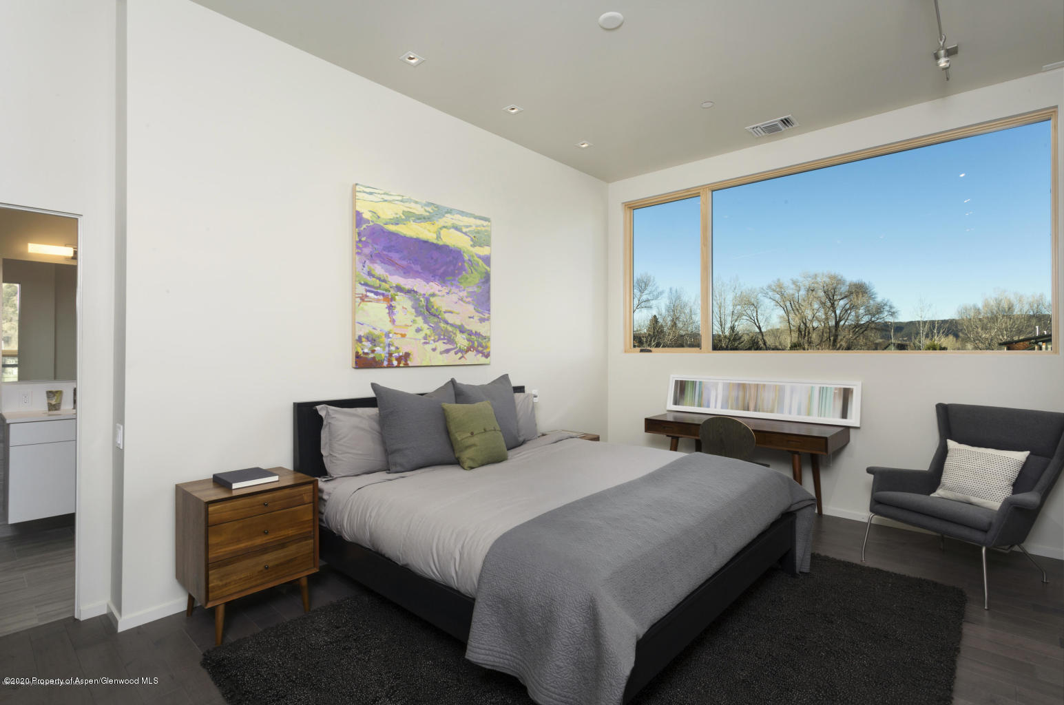 101 Willits Lane, Unit 107 Basalt, CO 81621 - Photo 7 of 16 a bedroom with a bed and a couch