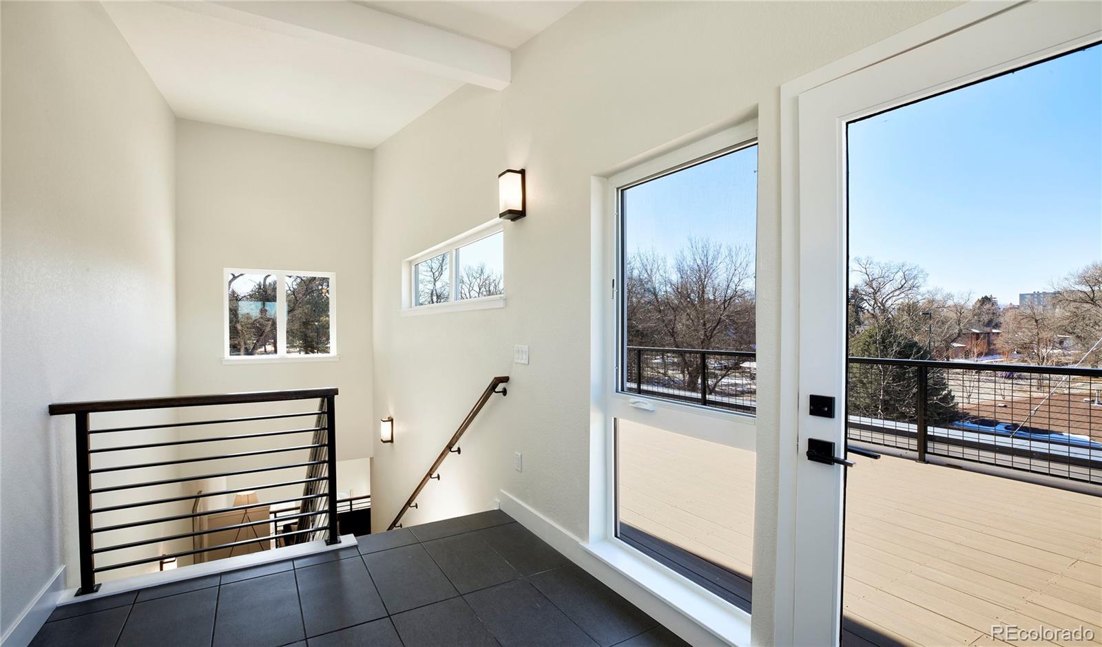 2951 East Evans Avenue Denver, CO 80210 - Photo 12 of 39 a view of a furniture in a room