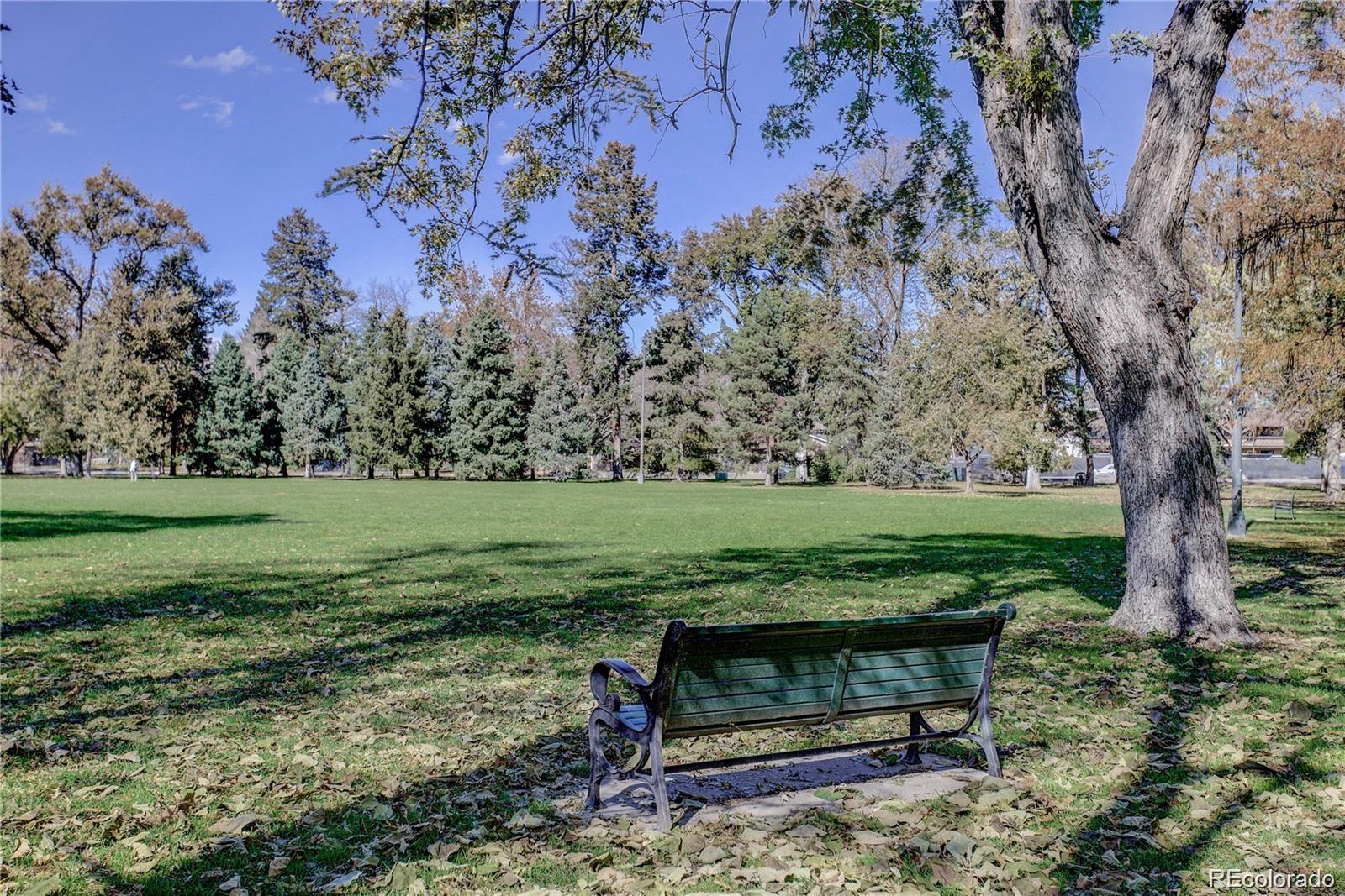 2951 East Evans Avenue Denver, CO 80210 - Photo 23 of 39 a view of a bench in a garden