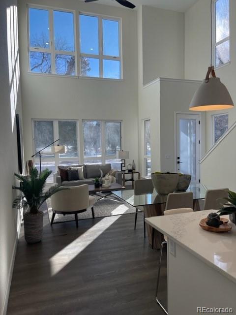 2951 East Evans Avenue Denver, CO 80210 - Photo 28 of 39 a living room with furniture and a wooden floor