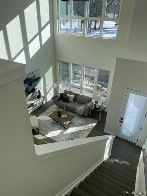 2951 East Evans Avenue Denver, CO 80210 - Photo 39 of 39 a living room with furniture and flat screen tv