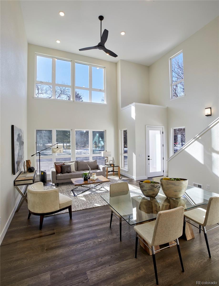 2951 East Evans Avenue Denver, CO 80210 - Photo 6 of 39 a living room with fireplace furniture and a table