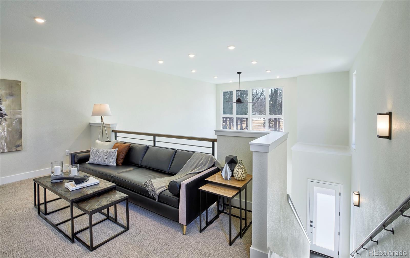 2951 East Evans Avenue Denver, CO 80210 - Photo 10 of 39 a living room with furniture