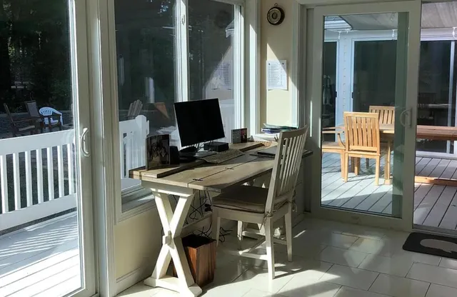 a view of balcony with furniture