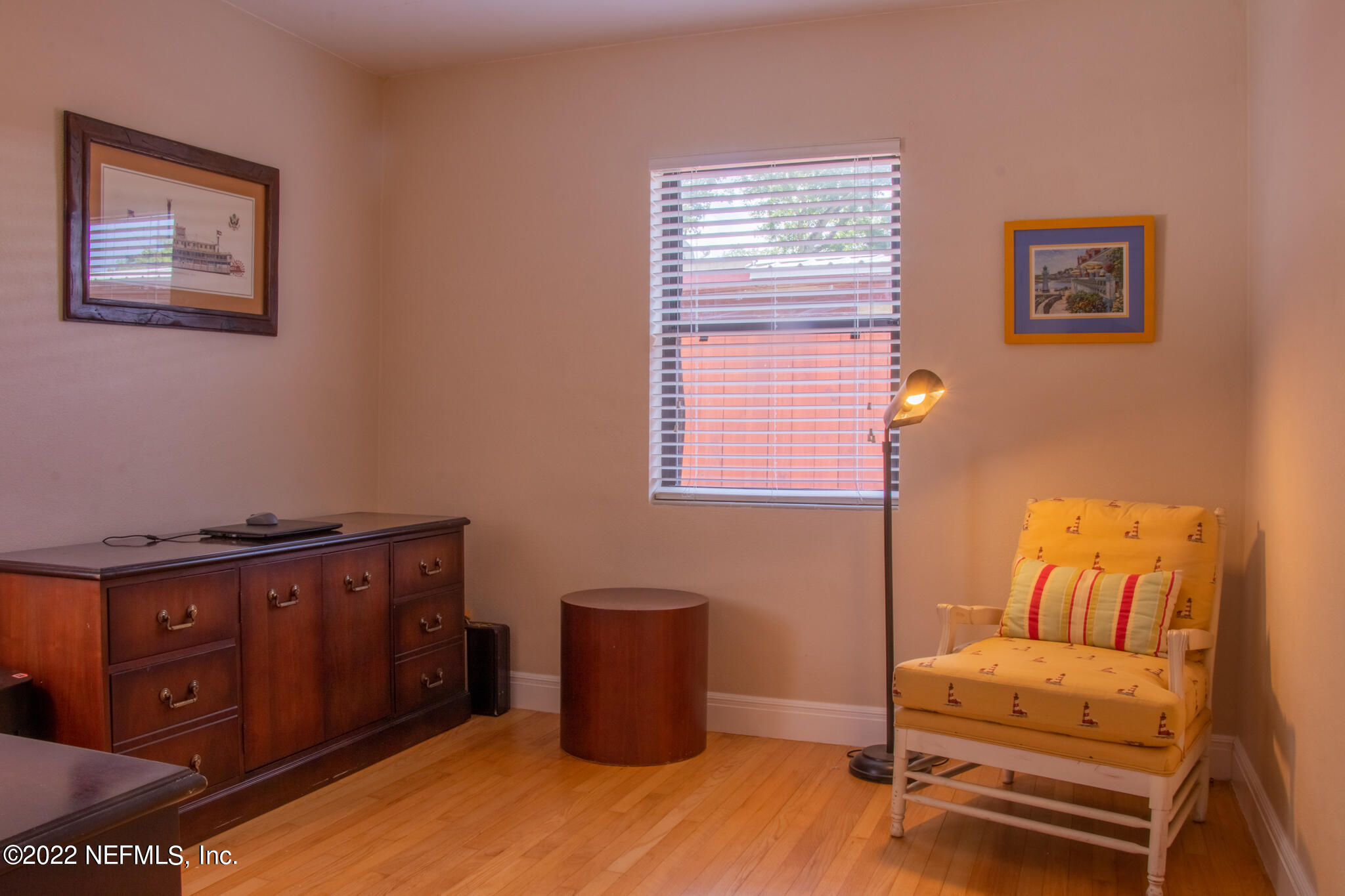 6415 Wesleyan Road Jacksonville, FL 32217 - Photo 15 of 36 a living room with furniture and wooden floor