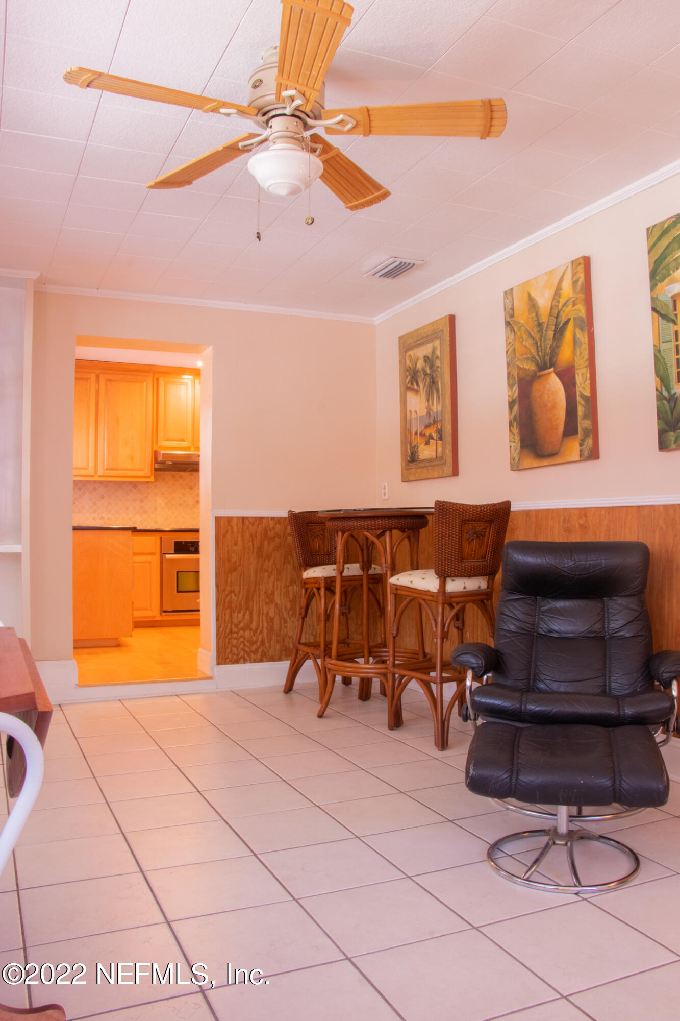 6415 Wesleyan Road Jacksonville, FL 32217 - Photo 20 of 36 a living room with furniture and a window
