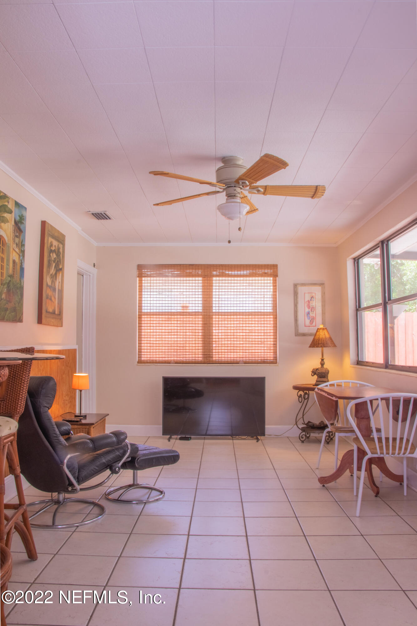6415 Wesleyan Road Jacksonville, FL 32217 - Photo 21 of 36 a living room with furniture and a window