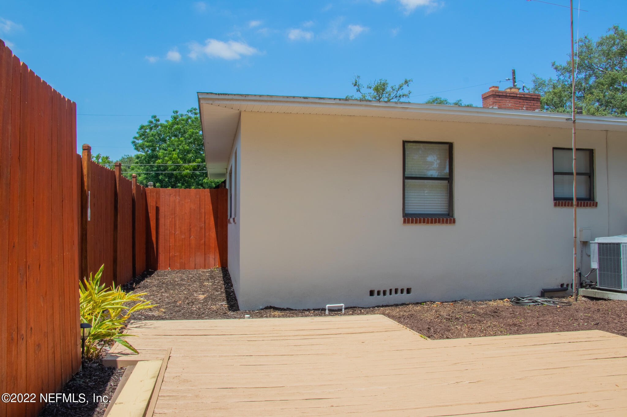 6415 Wesleyan Road Jacksonville, FL 32217 - Photo 28 of 36 a house with a outdoor space