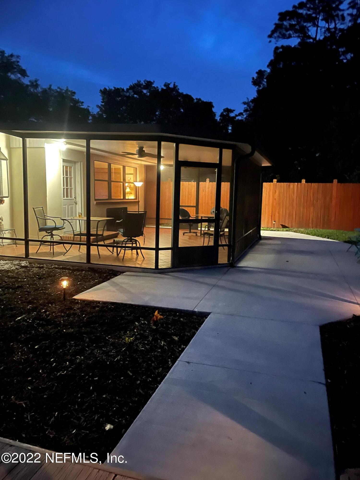 6415 Wesleyan Road Jacksonville, FL 32217 - Photo 33 of 36 a view of a house with a patio