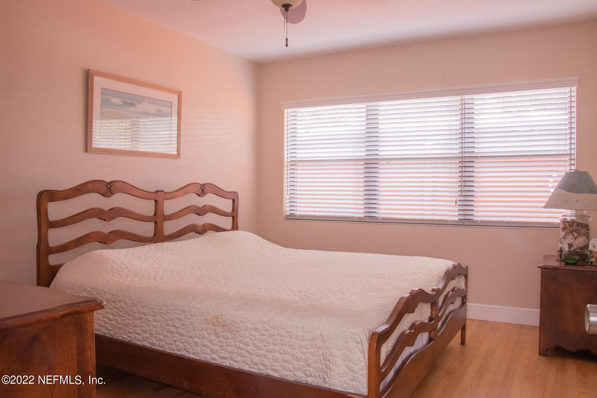 6415 Wesleyan Road Jacksonville, FL 32217 - Photo 9 of 36 a bedroom with a bed and a window