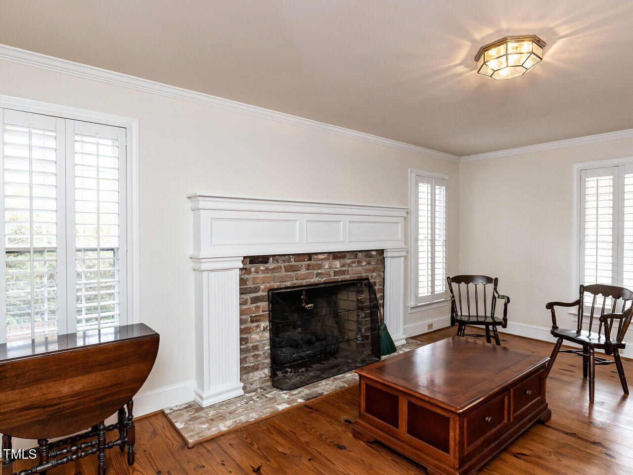 3701 Swann Street Raleigh, NC 27612 - Photo 12 of 30 013-1280x960-family-room-with-fireplace