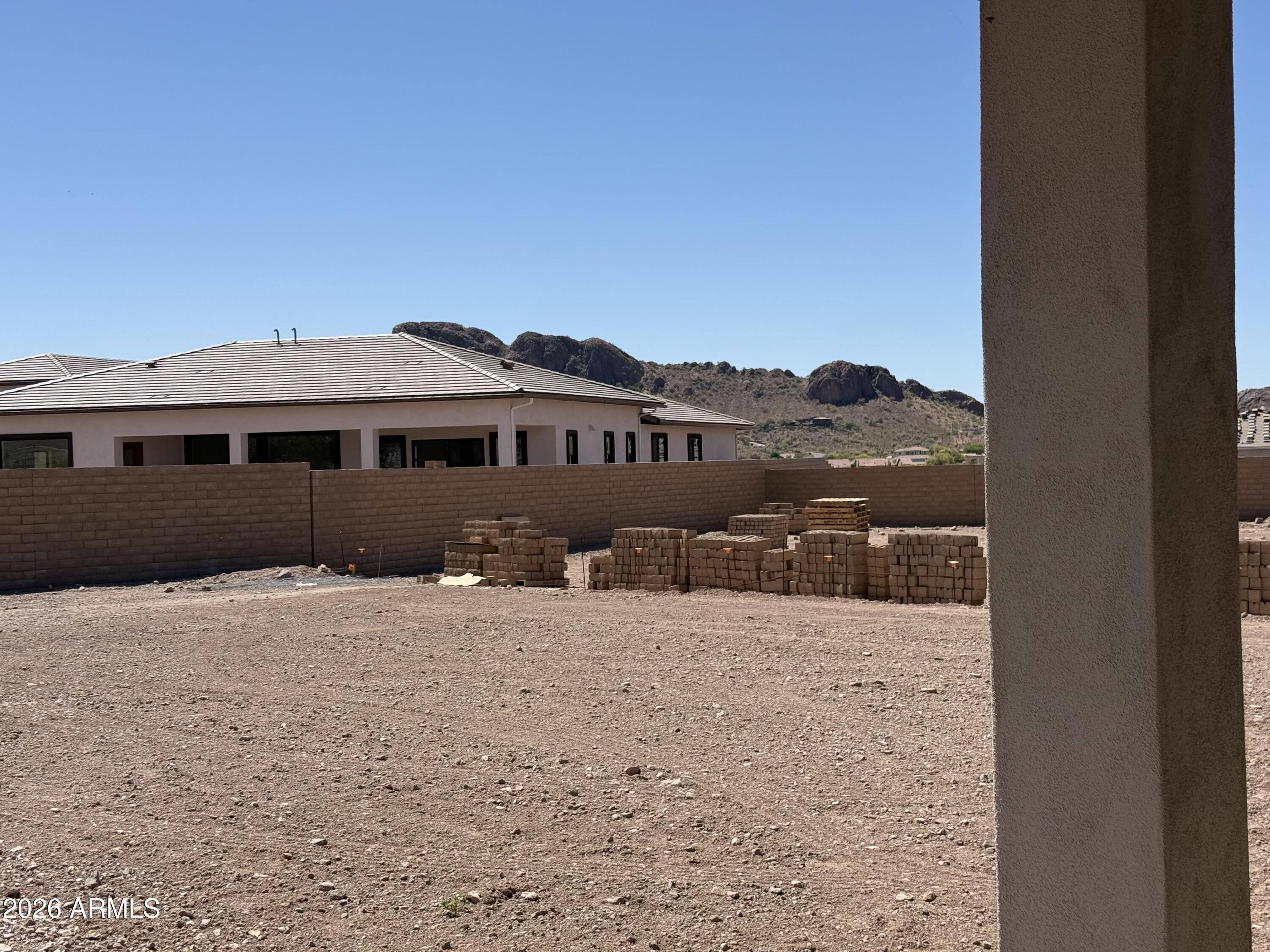 11139 East Rio Bravo Road Gold Canyon, AZ 85118 - Photo 12 of 14 a front view of a house with a yard