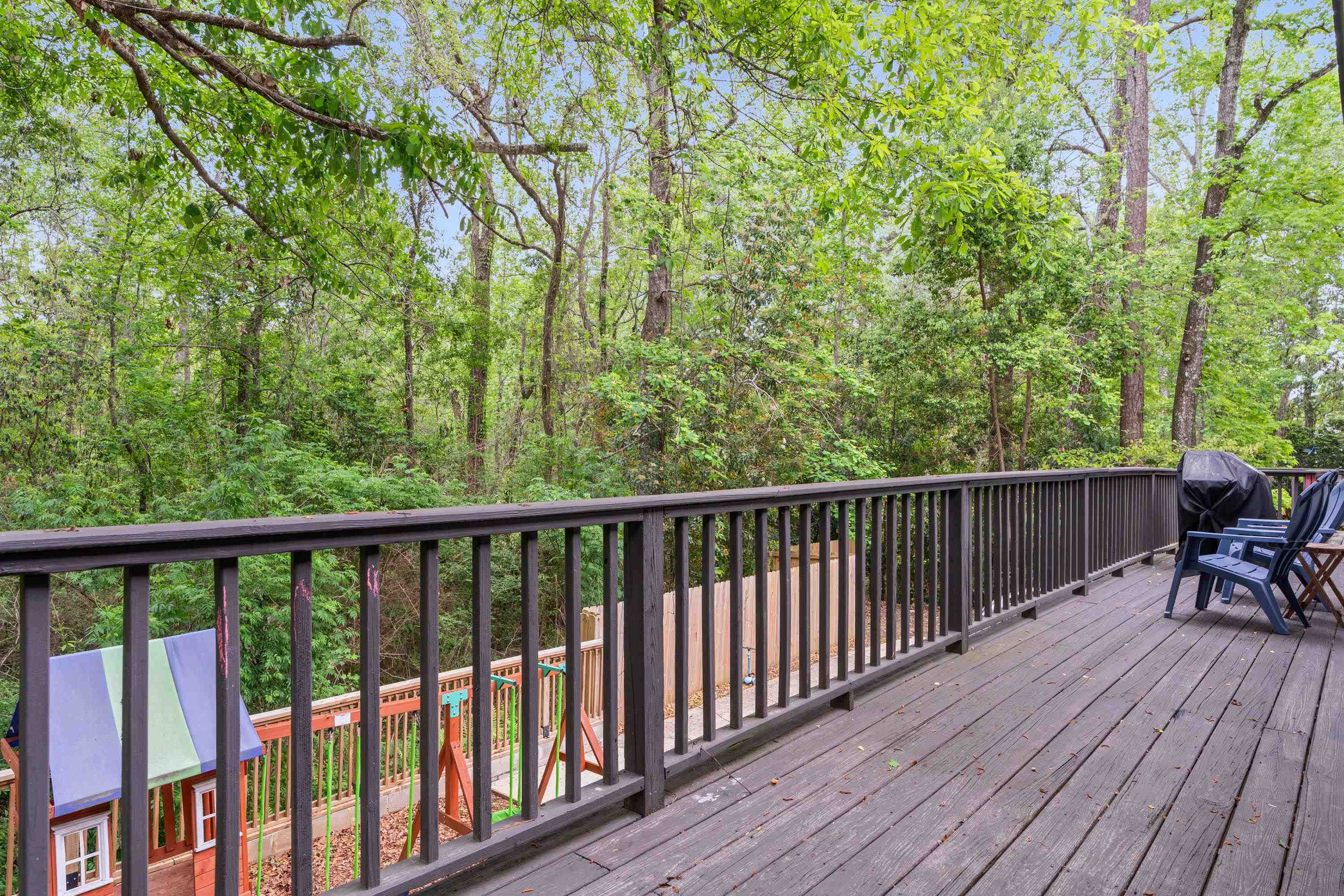 58 Caisson Trace Daphne, AL 36527 - Photo 19 of 27 Spacious Deck Overlooking Woods