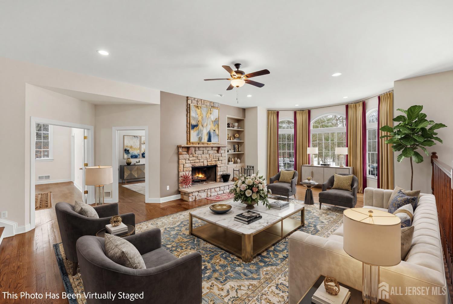 32 4 Bridges Road Chester, NJ 07930 - Photo 22 of 78 a living room with furniture potted plant and a large window