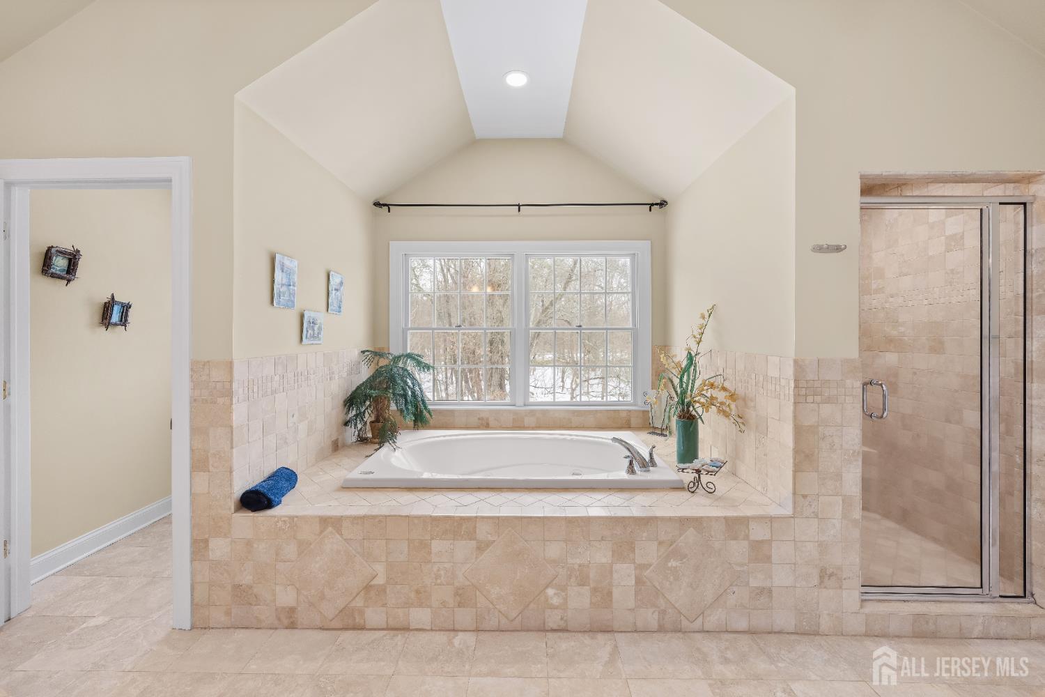 32 4 Bridges Road Chester, NJ 07930 - Photo 48 of 78 a bathroom with a tub and shower