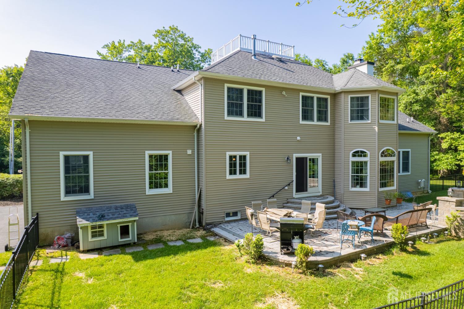 32 4 Bridges Road Chester, NJ 07930 - Photo 70 of 78 a front view of a house with swimming pool