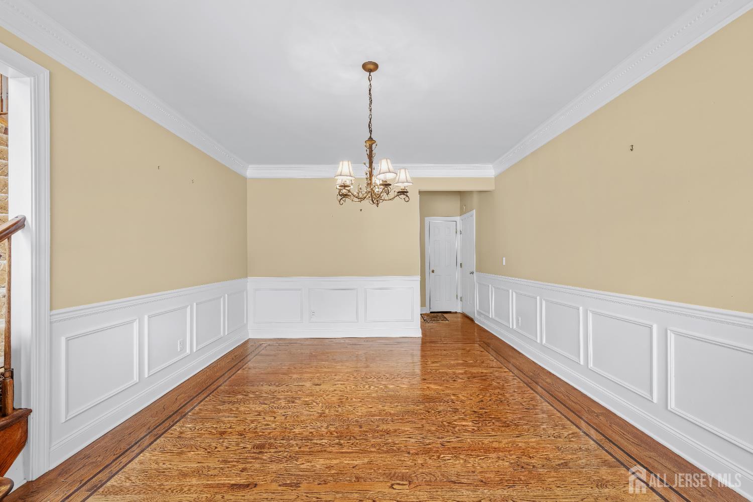32 4 Bridges Road Chester, NJ 07930 - Photo 9 of 78 a view of a room with cabinet wooden floor and chandelier