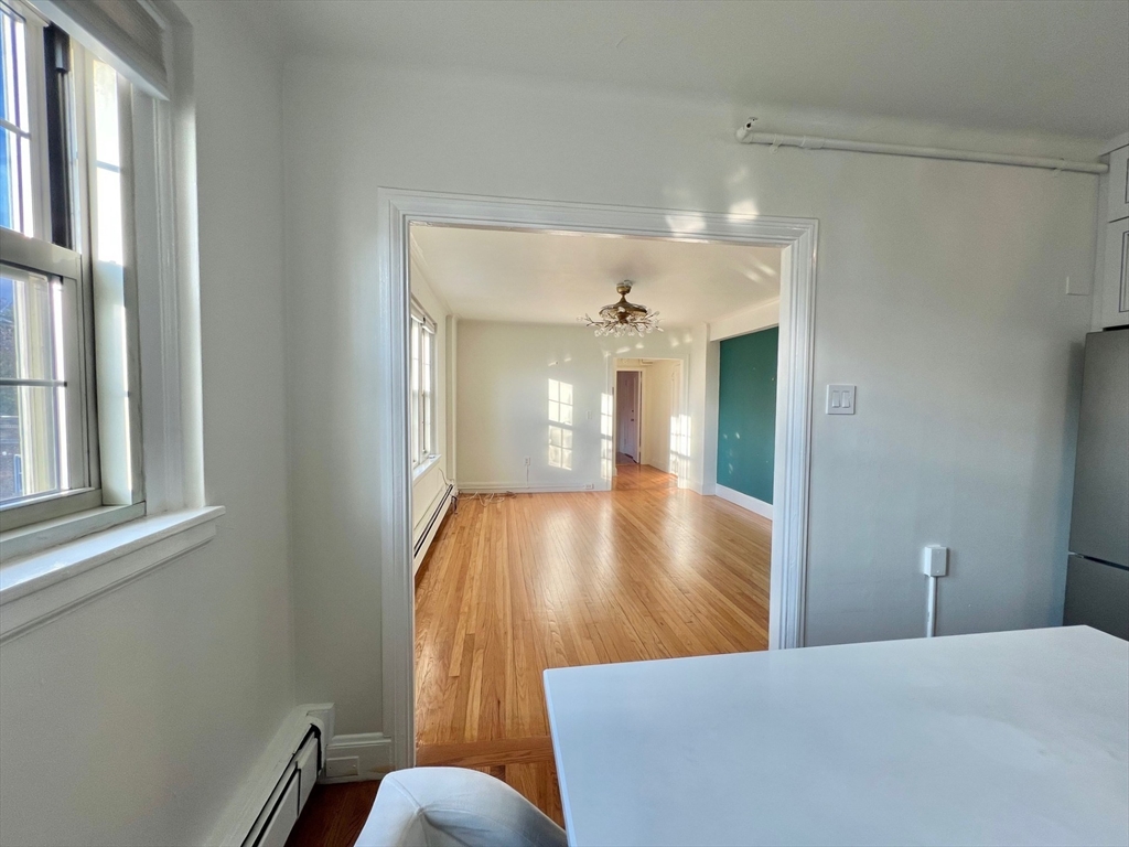 1454 Beacon Street, Unit 744 Brookline, MA 02446 - Photo 6 of 18 a view of kitchen and windows