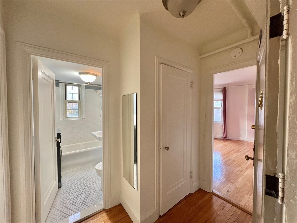 1454 Beacon Street, Unit 744 Brookline, MA 02446 - Photo 10 of 18 a view of a bathroom from a hallway