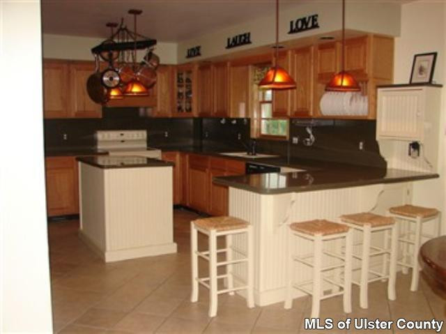 36 Sun Stone Ridge Stone Ridge, NY 12484 - Photo 3 of 4 a kitchen with a sink and cabinets