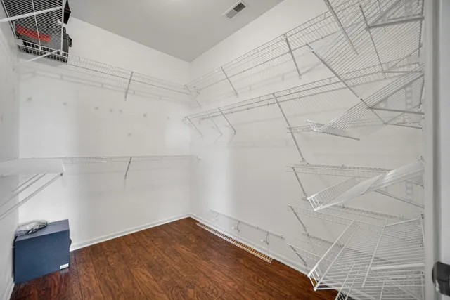 a view of a room with racks on the wall