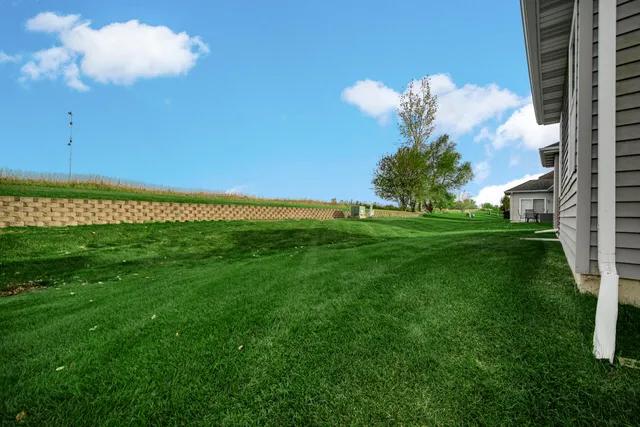 a view of a lake with a big yard