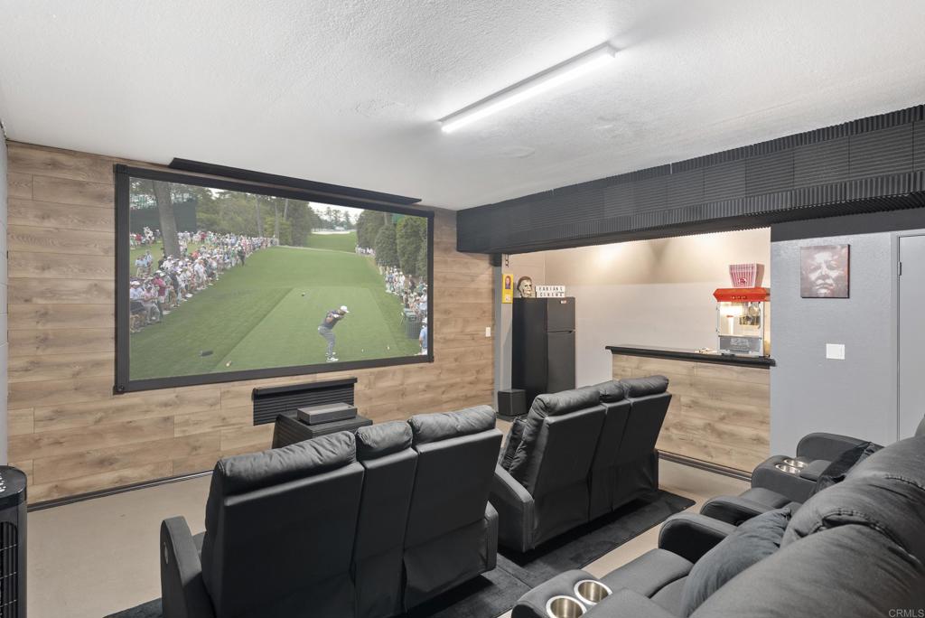 9309 Hillside Drive Spring Valley, CA 91977 - Photo 3 of 64 a living room with furniture and a flat screen tv