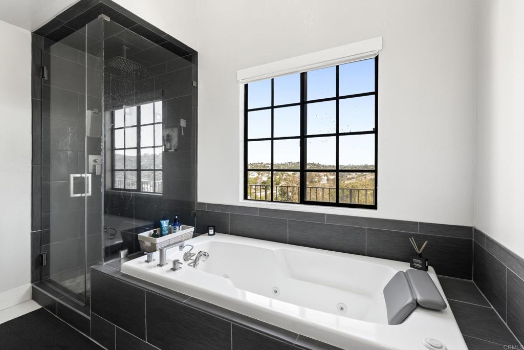 9309 Hillside Drive Spring Valley, CA 91977 - Photo 39 of 64 a white bath tub sitting next to a window