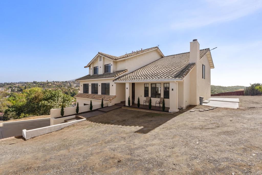9309 Hillside Drive Spring Valley, CA 91977 - Photo 51 of 64 a front view of a house with a yard