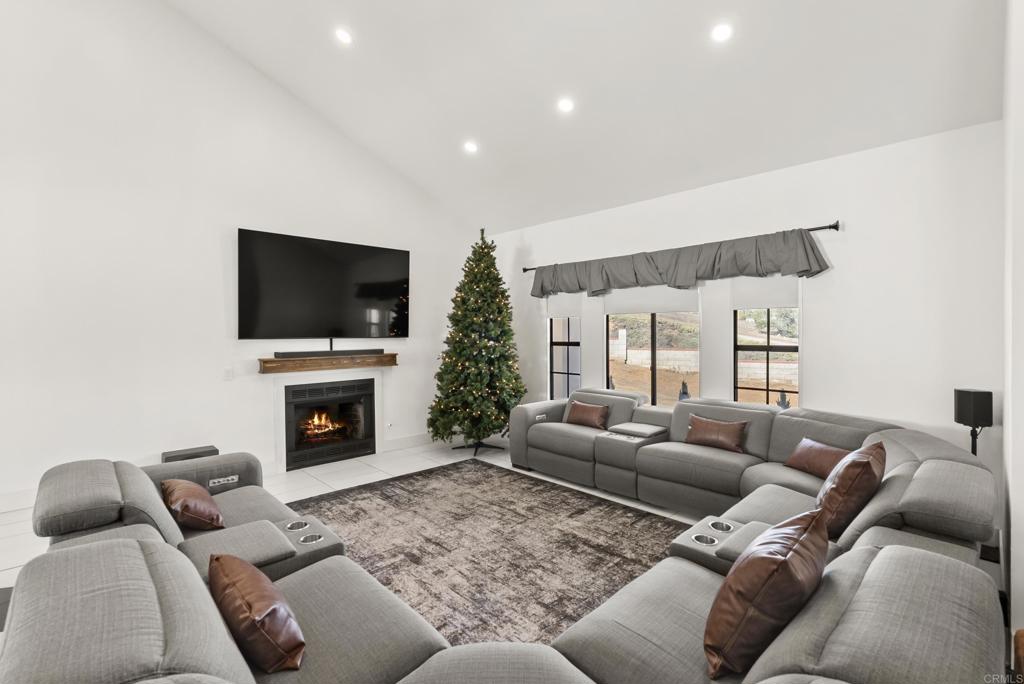 9309 Hillside Drive Spring Valley, CA 91977 - Photo 10 of 64 a living room with furniture and a fireplace