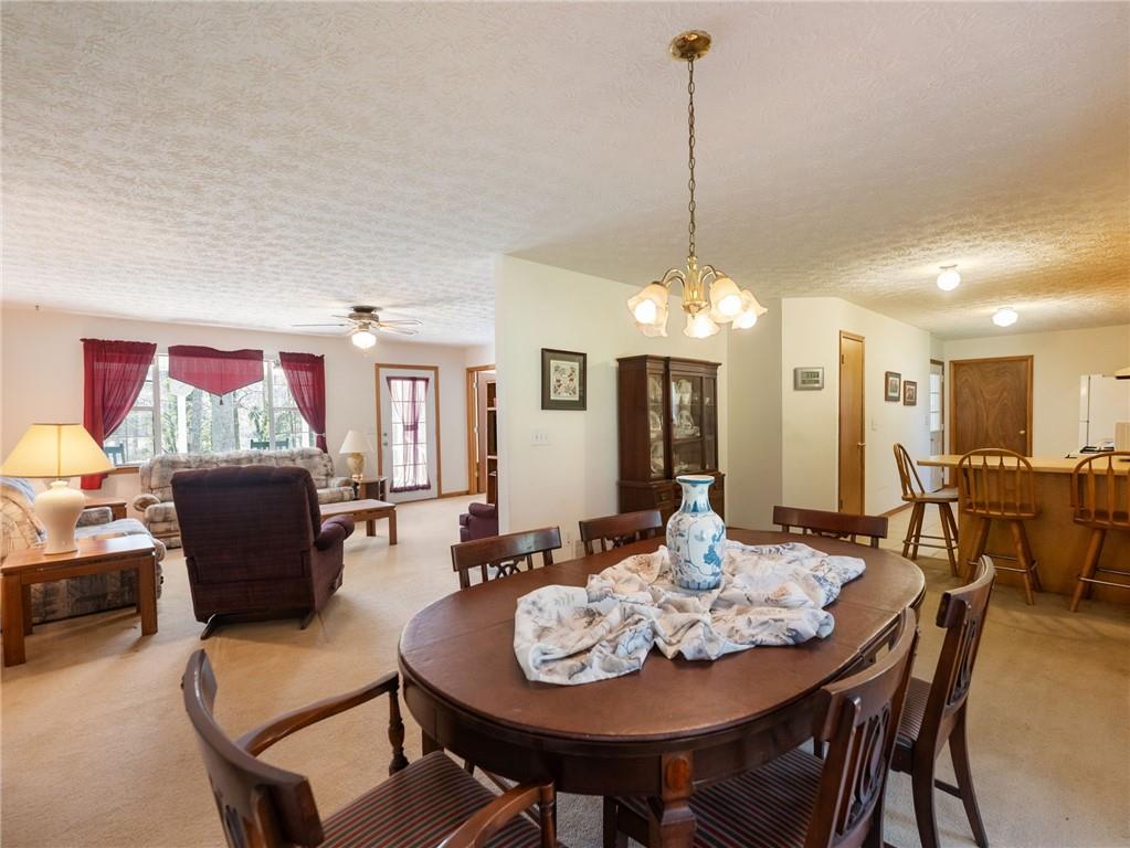2741 Old Dawsonville Road Gainesville, GA 30506 - Photo 11 of 18 a view of a dining room with furniture