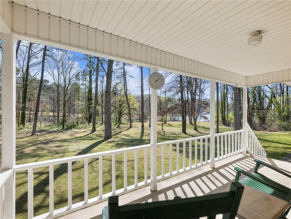 2741 Old Dawsonville Road Gainesville, GA 30506 - Photo 4 of 18 a view of a porch with wooden floor