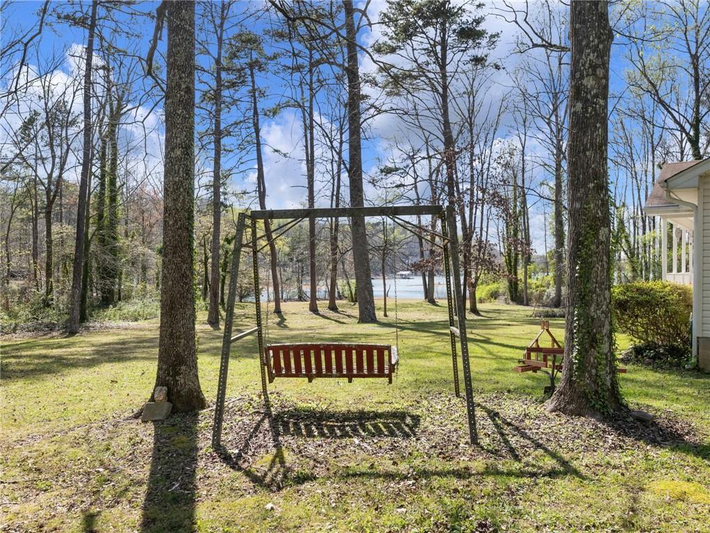 2741 Old Dawsonville Road Gainesville, GA 30506 - Photo 5 of 18 a view of a street with large tree