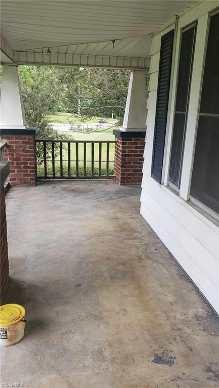 205 Cedar Lodge Road Thomasville, NC 27360 - Photo 20 of 22 Concrete wrap porch - What a place to sit and relax!