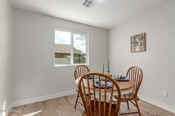 a view of a room with furniture window and wooden floor