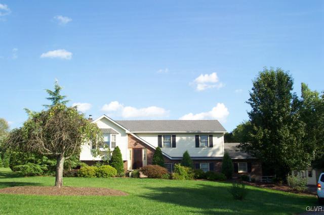 2131 Hendricks Road Pennsburg, PA 18073 - Photo 1 of 30 a front view of a house with a yard