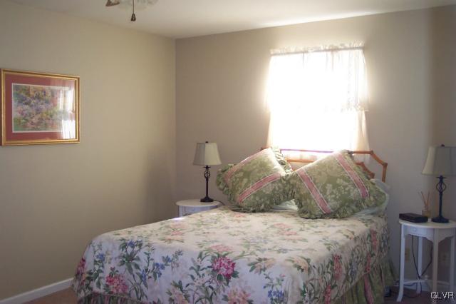 2131 Hendricks Road Pennsburg, PA 18073 - Photo 17 of 30 a bedroom with a bed and a window