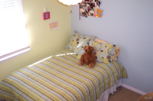 2131 Hendricks Road Pennsburg, PA 18073 - Photo 21 of 30 a bedroom with a bed and a painting on the wall