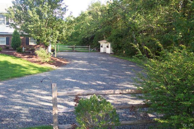2131 Hendricks Road Pennsburg, PA 18073 - Photo 30 of 30 a view of a yard with plants and trees