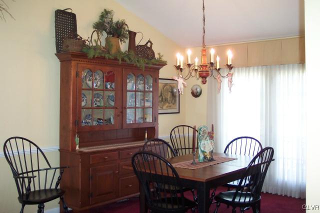 2131 Hendricks Road Pennsburg, PA 18073 - Photo 6 of 30 a view of a dining room with furniture and chandelier