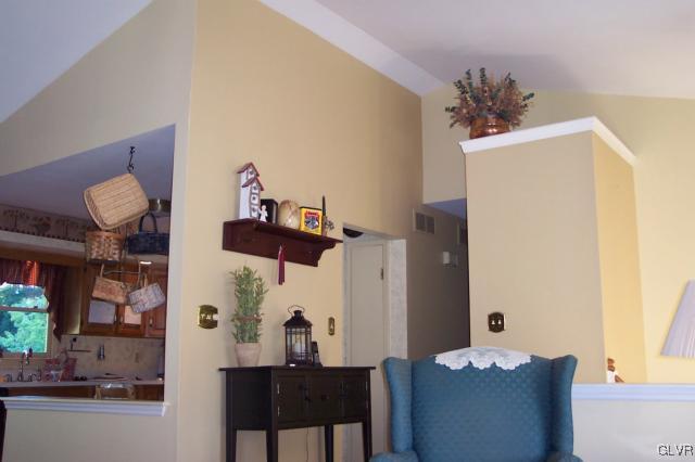 2131 Hendricks Road Pennsburg, PA 18073 - Photo 10 of 30 a living room with furniture and a chandelier