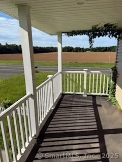 a view of a balcony with a garden