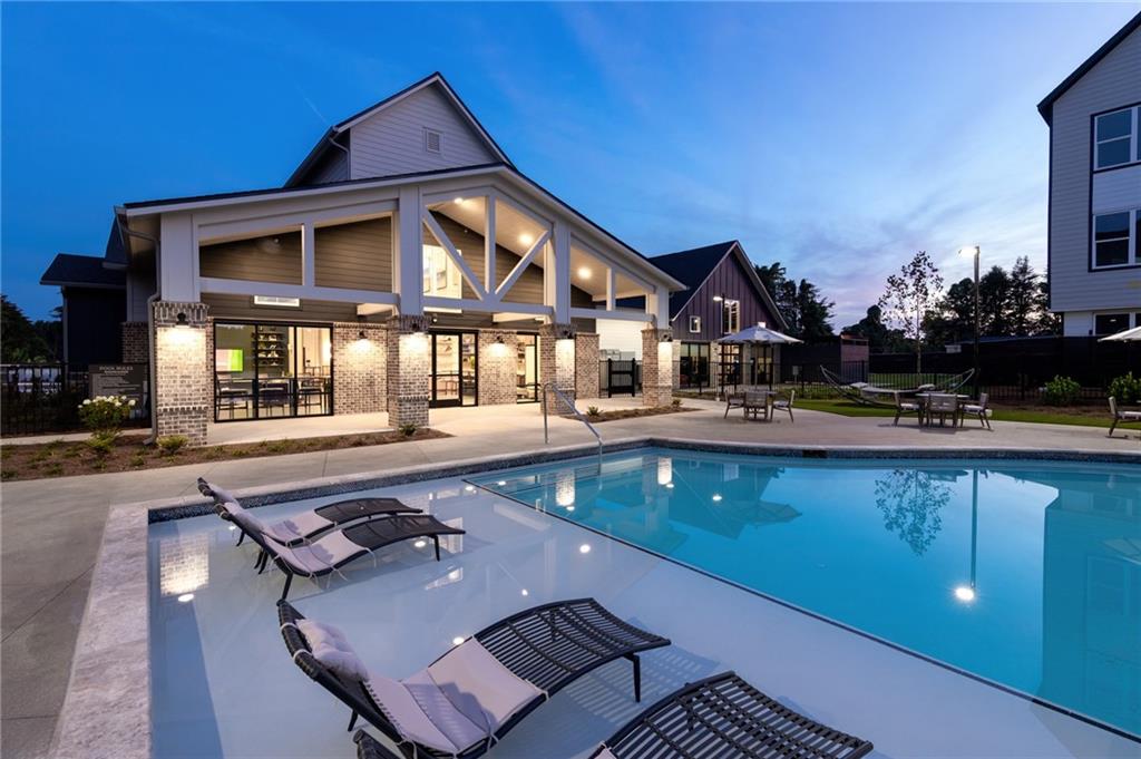 3890 Floyd Road Southwest, Unit THB1 Austell, GA 30106 - Photo 2 of 40 a view of house with swimming pool outdoor seating